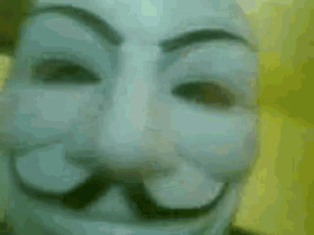 a close up of a person wearing a mask with a mustache .