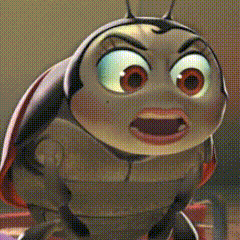a close up of a cartoon bug with big eyes and a big mouth .