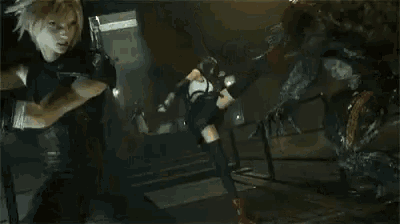 a woman is kneeling down in front of a monster in a dark room .