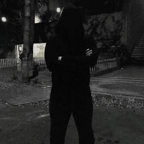 a silhouette of a person with a smiley face and the word mind written on it