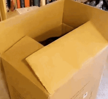 a cardboard box with a sticker on it that says ' fragile ' on it