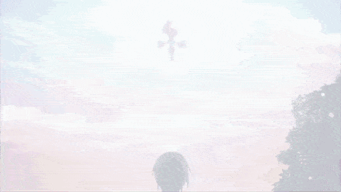 a person standing in front of a cloudy sky with a cross flying in the sky