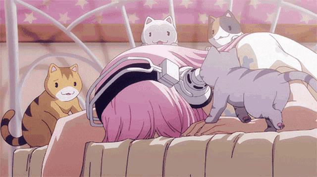 a girl with pink hair is laying on a bed with cats