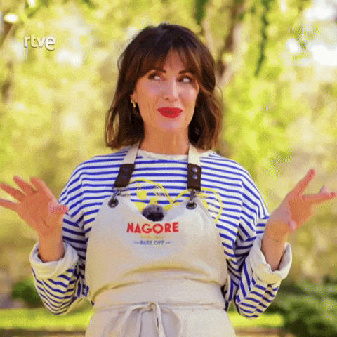 a woman wearing a striped shirt and an apron with the word nagore on it