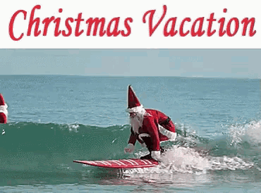 santa claus riding a wave on a surfboard in the ocean