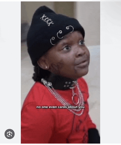 a young girl wearing a black beanie and a red shirt says no one even cares about you