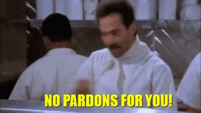 a man says no pardons for you while standing in a kitchen