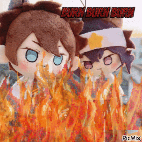 a couple of stuffed animals standing in front of a fire with burn burn burn written in red