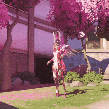 a woman in a red and white outfit is standing in front of a cherry blossom tree