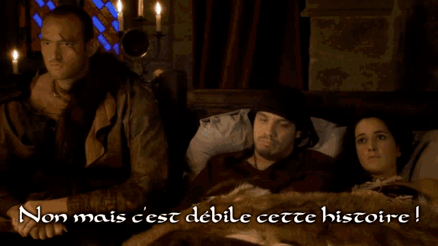 a group of people are sitting in a room with the words non mais c'est debile cette histoire