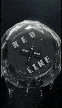 a black and white logo for aku with a crowd behind it