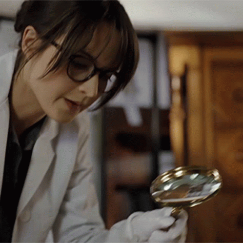 Looking At The Magnifying Glass Helena GIF - Looking At The Magnifying Glass Helena Blood And Treasure GIFs