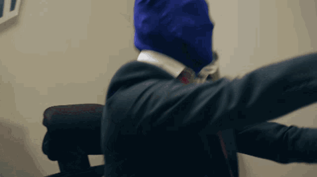 a man with a blue mask on his face