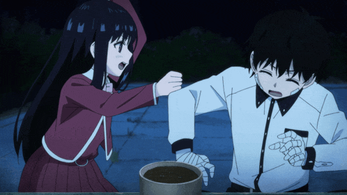 a boy and a girl are standing next to each other and the girl is giving the boy a fist bump