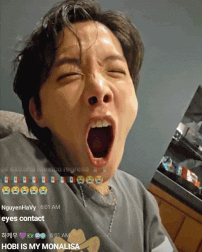 a man with his mouth wide open is being watched by someone named hobi is my monalisa