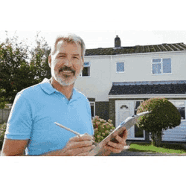 a man is standing in front of a house holding a clipboard and pen .