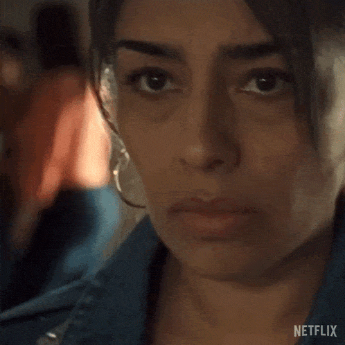 a close up of a woman 's face with a netflix logo on the bottom .