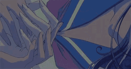 a person holding another person 's hand with their fingers crossed