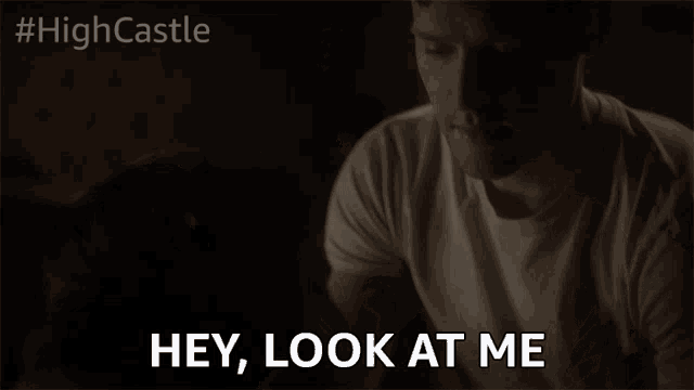 a man says hey look at me in the dark