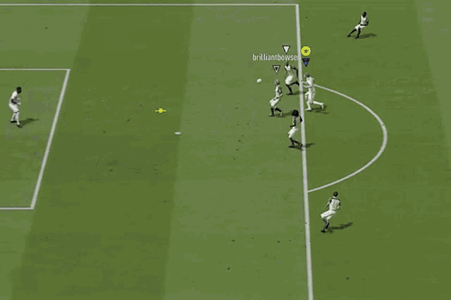a soccer game is being played on a field that has fifa on the banner