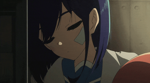 a girl with blue hair has a bandage on her cheek