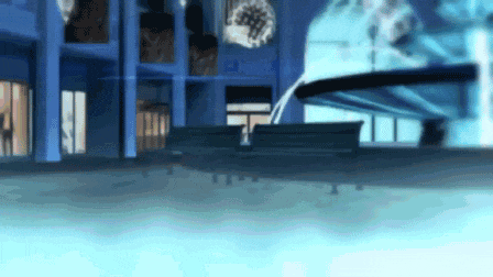 a blurry picture of a building with a swimming pool in the background .