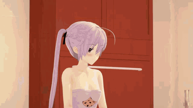 a girl with purple hair is standing in a kitchen wearing a towel with a cookie on it