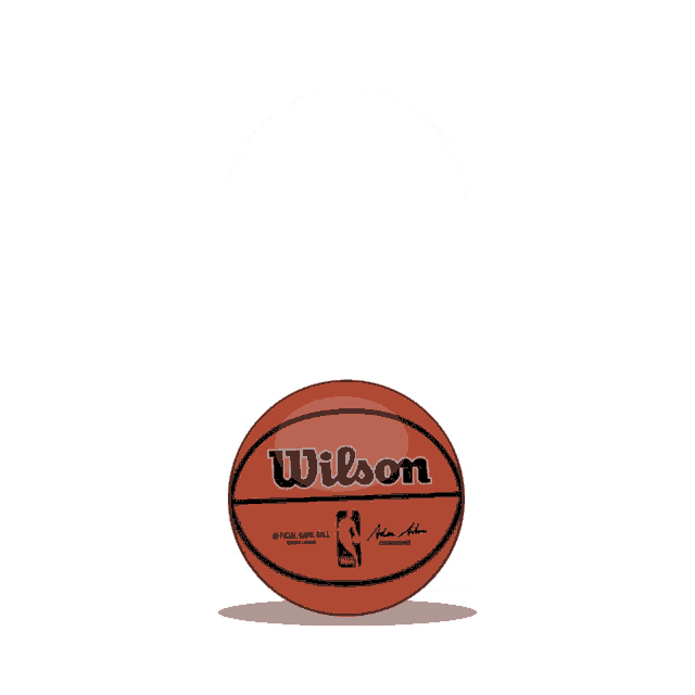 a wilson basketball is floating on a white background