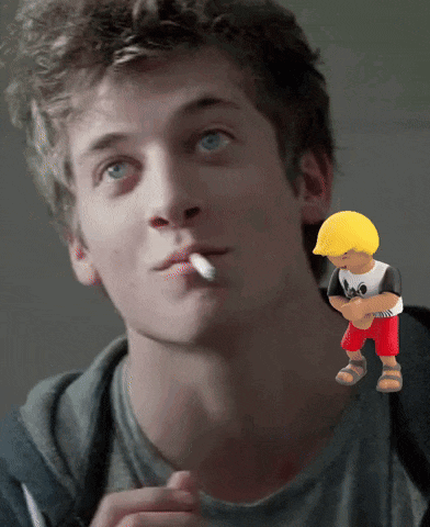 a young man is smoking a cigarette with a toy boy in a hard hat standing next to him