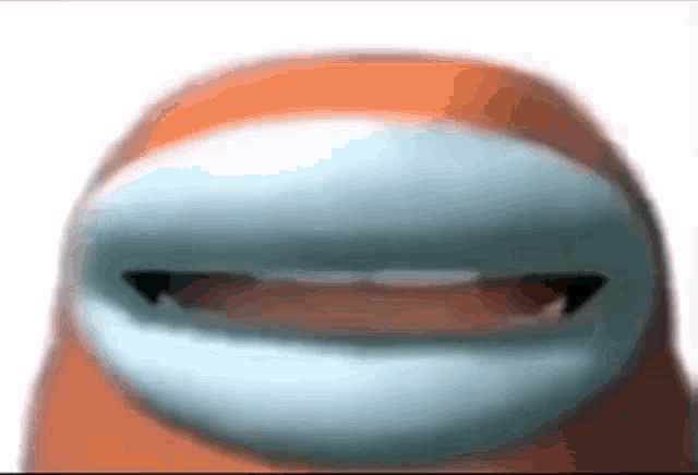 a close up of an orange among us character 's face with a white mask .