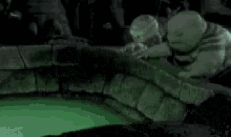 a couple of cartoon characters are standing next to each other in a dark room .