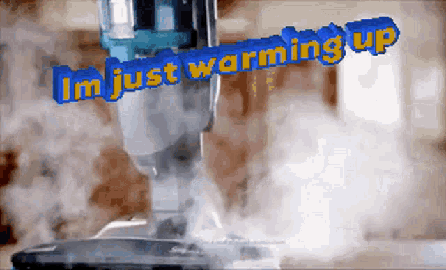 a vacuum cleaner with the words i 'm just warming up written on it