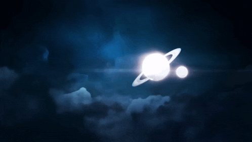 a planet with a ring around it is floating in the sky
