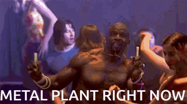 a group of people are dancing with the words metal plant right now