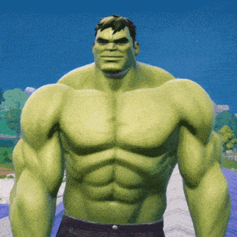 a hulk without a shirt is standing on a road