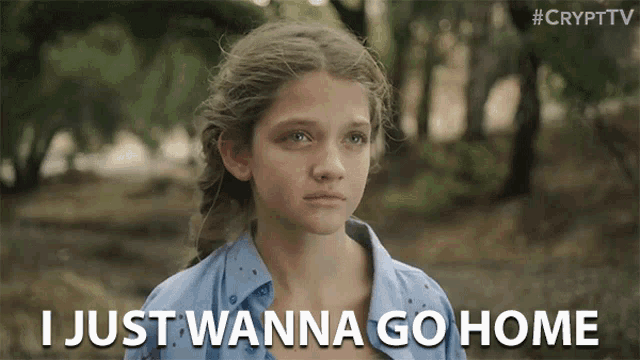 a girl says " i just wanna go home " in front of trees