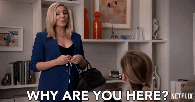 a woman talking to another woman with the words why are you here netflix