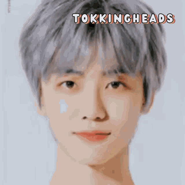 a close up of a person 's face with the words `` tokingheads '' written above it .