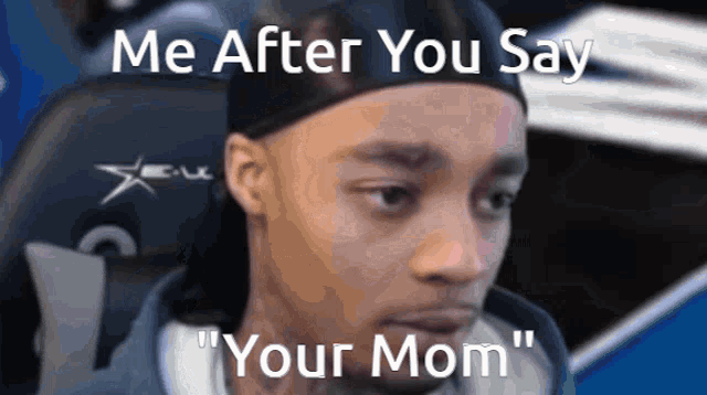 a man sitting in a chair with the words " me after you say your mom " above him