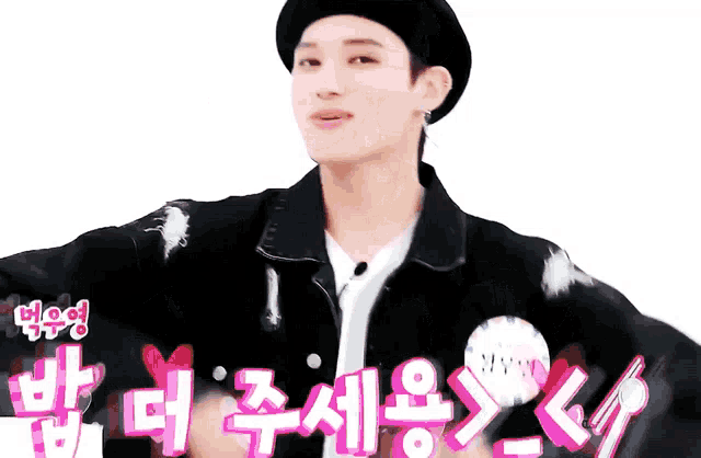 a young man wearing a black hat and a black jacket is standing in front of a sign that says blood .