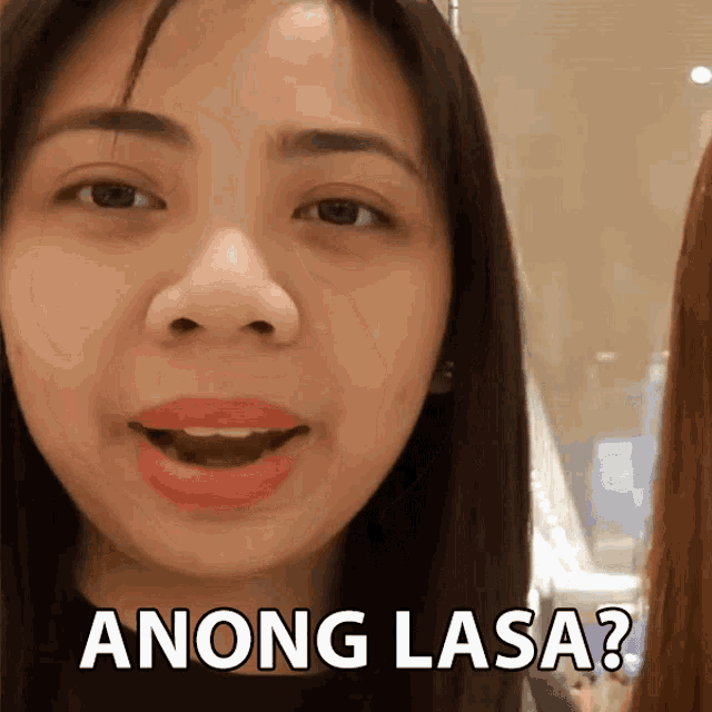 a close up of a woman 's face with the words " anong lasa " on the bottom