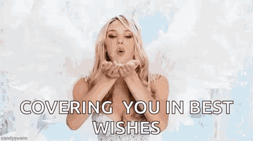 a woman in a white dress is blowing a kiss while covering you in best wishes .