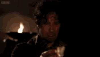a man is eating a sandwich with the words get out get out written above him