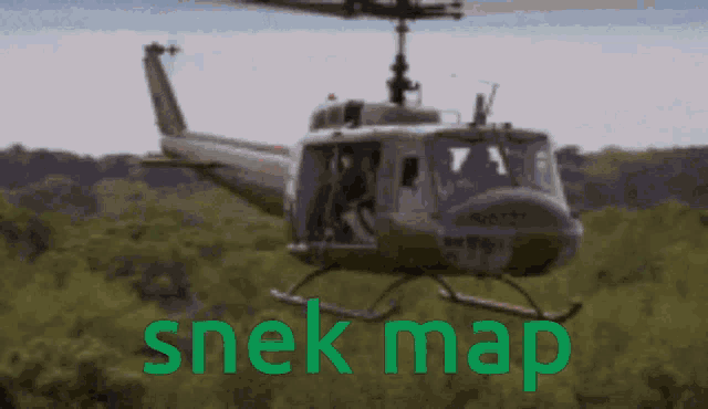 a plane is flying over a lush green forest and the words " snek map " are visible