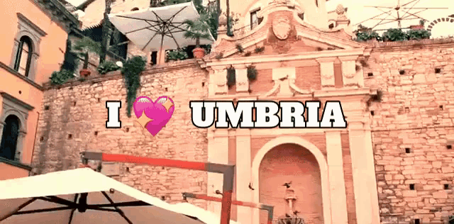 a sign that says i love umbria with a heart
