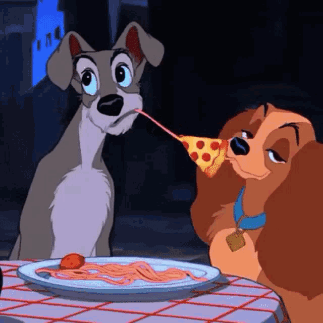 a couple of cartoon dogs sitting at a table eating spaghetti and pizza