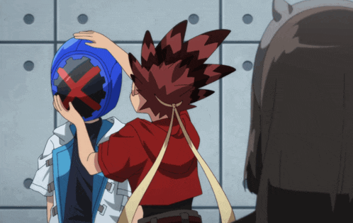 a boy in a red shirt holds a blue helmet with a red x on it