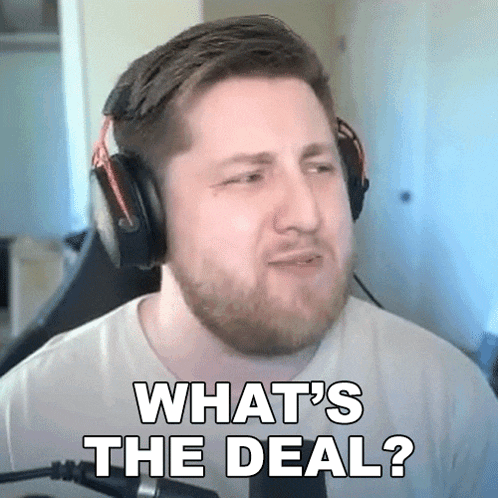 a man with a beard wearing headphones is asking what 's the deal ?