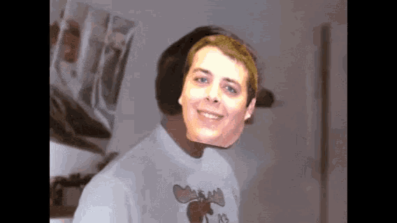 a man wearing a moose shirt with the number 10 on the front