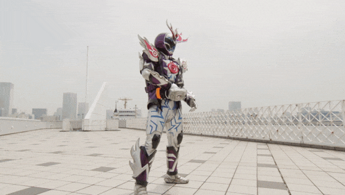 a man in a purple suit is surrounded by purple and white explosions